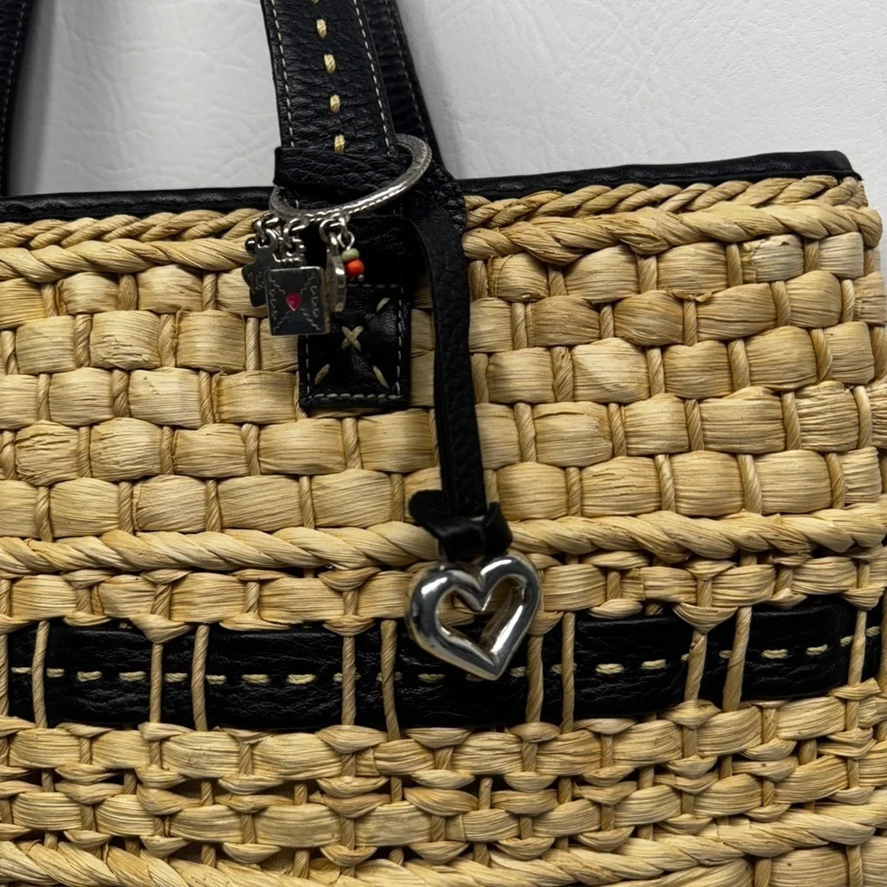 Brighton women’s straw handbag with charms, leather trim